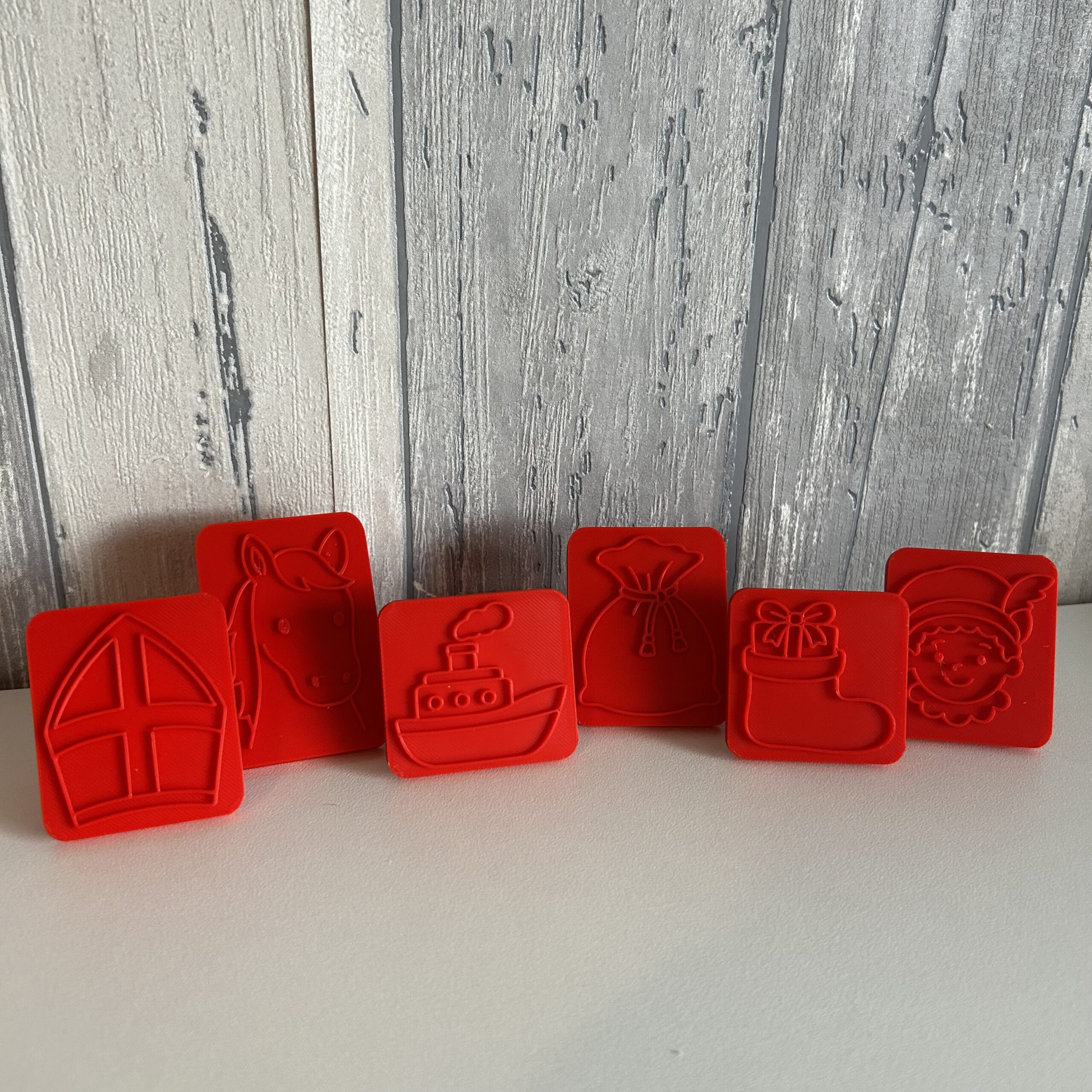 Sinterklaas stempels klei/zand rood of geel